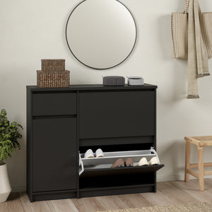 Naia Shoe Cabinet with 2 Shoe Compartments, 1 Door and 1 Drawer in Black Matt Furniture To Go 70292206gmgm 5713035082099 The Naia collection offers a tribute to timeless furniture. The shoe cabinet is funtional and has plenty of storage space. Available in 4 different colours. Dimensions: 929mm x 1089mm x 315mm (Height x Width x Depth) 
 High quality laminated board (resistant to damage and scratches, moisture and high temperature) 
 Easy gliding drawer runners 
 Stylish and contemporary 
 Easy self assembl