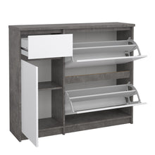 Load image into Gallery viewer, Naia Shoe Cabinet with 2 Shoe Compartments, 1 Door and 1 Drawer in Concrete and White High Gloss Furniture To Go 70292206gxuu 5713035082105 The Naia collection offers a tribute to timeless furniture. The shoe cabinet is funtional and has plenty of storage space. Available in 4 different colours. Dimensions: 929mm x 1089mm x 315mm (Height x Width x Depth) 
 High quality laminated board (resistant to damage and scratches, moisture and high temperature) 
 Easy gliding drawer runners 
 Stylish and contemporary 