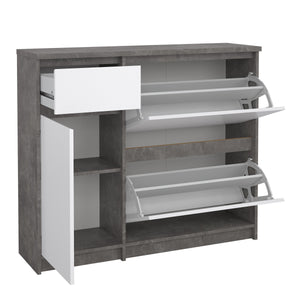 Naia Shoe Cabinet with 2 Shoe Compartments, 1 Door and 1 Drawer in Concrete and White High Gloss Furniture To Go 70292206gxuu 5713035082105 The Naia collection offers a tribute to timeless furniture. The shoe cabinet is funtional and has plenty of storage space. Available in 4 different colours. Dimensions: 929mm x 1089mm x 315mm (Height x Width x Depth) 
 High quality laminated board (resistant to damage and scratches, moisture and high temperature) 
 Easy gliding drawer runners 
 Stylish and contemporary 