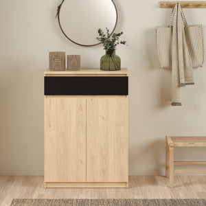 Naia Shoe Cabinet with 2 Doors +1 Drawer in Jackson Hickory Oak & Black Furniture To Go 70292209hlgm 5713035082266 Experience the perfect blend of style and functionality with the Naia Shoe Cabinet. Designed with a sleek combination of Jackson Hickory Oak and Black finishes, this cabinet adds a touch of elegance to your space. Featuring two doors and a convenient black drawer, it offers ample storage for your shoe collection while keeping your entryway neat and organized. With its versatile design and quali