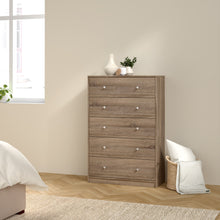 Load image into Gallery viewer, May Chest of 5 Drawers in Truffle Oak Furniture To Go 70870329cjcj 5713035064941 The sleek design of the May collection creates a perfect balance between your room&#39;s style, and useful function. It&#39;s easy to complement this piece with another from the May range and create a bold, uniform look in your space. This drawer is perfect for small spaces that require extra storage. Dimensions: 1081mm x 724mm x 298mm (Height x Width x Depth) 
 High quality laminated board (resistant to damage and scratches, moisture 