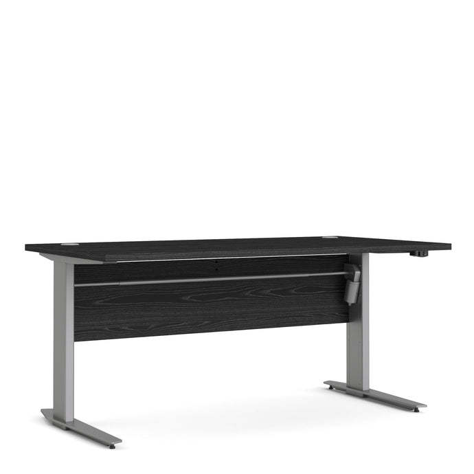 Prima Desk 150 cm in Black woodgrain with Height adjustable legs with electric control in Silver grey steel Furniture To Go 720804026103a 5060653086313 The Prima range of desks with adjustable legs are ideal for the home office, versatile and stylish enough to be used throughout the home in any room you choose. Dimensions: 752mm x 1501mm x 801mm (Height x Width x Depth) 
 High quality laminated board (resistant to damage and scratches, moisture and high temperature) 
 Perfect for small spaces 
 Stylish and 