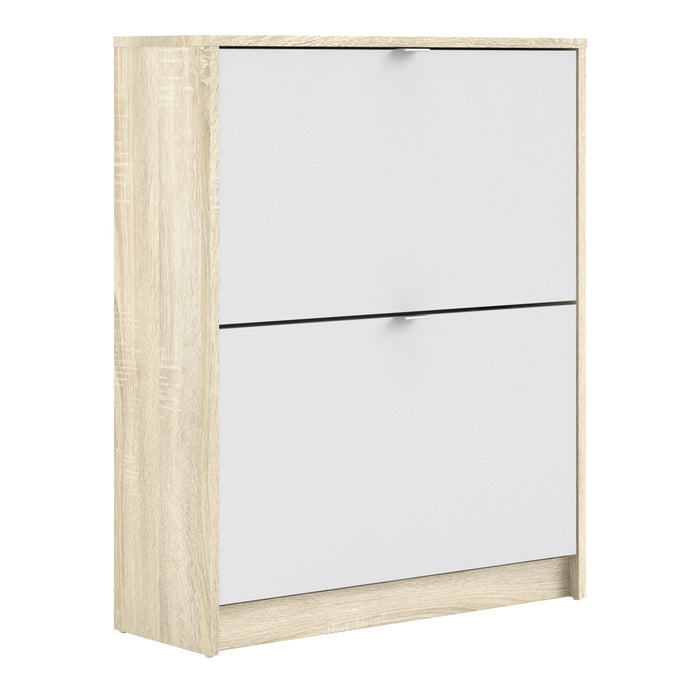 Shoes Shoe cabinet w. 2 tilting doors and 2 layers Oak structure White Furniture To Go 72359005ak49 5713035047722 The Shoes range provides a stylish solution for any cluttered hall. The sleek design allows for plenty of shoe storage without dominating your space. Available with a number of drawers, styles and fronts, the Shoes collection makes for an attractive yet understated addition to your home decor in addition to its practical application. Dimensions: 852mm x 703mm x 241mm (Height x Width x Depth) 
 T