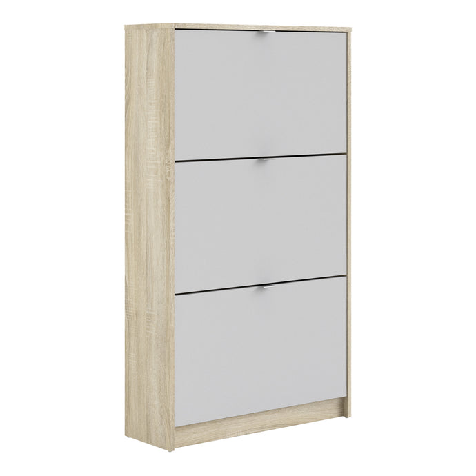 Shoes Shoe cabinet w. 3 tilting doors and 2 layers Oak structure White Furniture To Go 72359006ak49 5713035047746 The Shoes range provides a stylish solution for any cluttered hall. The sleek design allows for plenty of shoe storage without dominating your space. Available with a number of drawers, styles and fronts, the Shoes collection makes for an attractive yet understated addition to your home decor in addition to its practical application. Dimensions: 1236mm x 703mm x 241mm (Height x Width x Depth) 
 