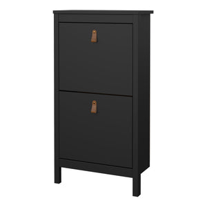 Barcelona Shoe Cabinet 2 flap doors Matt Black Furniture To Go 72579683gmgm 5060933422084 Introducing the Barcelona Shoe Cabinet with Two Flap Doors – a sophisticated and modern wardrobe designed to add an elegant touch to your space. With its sleek design and a simple metal handle, this two-door cabinet offers a perfect blend of style and functionality. For those seeking a bolder statement, it is also available in a contrasting matt black finish. Experience the essence of contemporary elegance with the Bar
