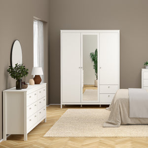 Madrid Double dresser 4+4 drawers in White Furniture To Go 726796634949 5713035068314 A contemporary chest of drawers in an elegant design complete with a simple metal handle, also available in contrasting matt black Dimensions: 797mm x 1594mm x 384mm (Height x Width x Depth) 
 High quality laminated board (resistant to damage and scratches, moisture and high temperature) 
 Made from PEFC Certified sustainable wood 
 Easy self assembly 
 Made in Denmark 
 Easy gliding drawer runners 
 Assembly instructions: