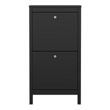 Load image into Gallery viewer, Madrid Shoe Cabinet 2 flap doors Matt Black Furniture To Go 72679683gmgm 5713035082969 Introducing the Madrid Shoe Cabinet with Two Flap Doors – a sophisticated and modern wardrobe designed to add an elegant touch to your space. With its sleek design and a simple metal handle, this two-door cabinet offers a perfect blend of style and functionality. For those seeking a bolder statement, it is also available in a contrasting matt black finish. Experience the essence of contemporary elegance with the Madrid Sh