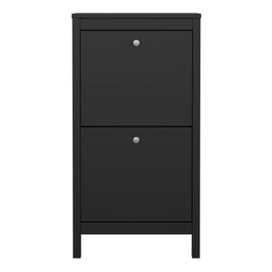 Madrid Shoe Cabinet 2 flap doors Matt Black Furniture To Go 72679683gmgm 5713035082969 Introducing the Madrid Shoe Cabinet with Two Flap Doors – a sophisticated and modern wardrobe designed to add an elegant touch to your space. With its sleek design and a simple metal handle, this two-door cabinet offers a perfect blend of style and functionality. For those seeking a bolder statement, it is also available in a contrasting matt black finish. Experience the essence of contemporary elegance with the Madrid Sh