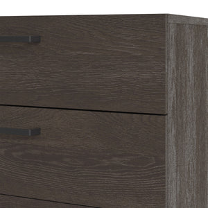 Dallas Double dresser 8 drawers Rovere Gessato Dark Oak Furniture To Go 73070533glgl 5713035075343 Introducing the Dallas 8 Drawer Double Dresser, a stylish and practical piece of furniture that offers ample storage space for all of your clothing, linens, and personal items. With its contemporary design and beautiful Rovere Gessato dark oak colour, this dresser provides a modern and cohesive ambience that is sure to elevate any room in your home. Featuring eight spacious drawers, this double dresser is equi
