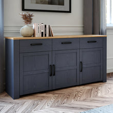 Load image into Gallery viewer, Bohol Sideboard in Riviera Oak/Navy Furniture To Go 801bhlk231-m348 5904767832315 The Bohol collection draws inspiration from its timeless charm and rustic style, embracing its simplicity and natural elegance. What truly sets this collection apart from others is its exquisite decor - featuring three colourways with an Oak finish. The subtle elegance of the light Riviera Oak contributes by adding a focal point to each piece. Also featuring black handles with soft close doors, making it truly stand out in any