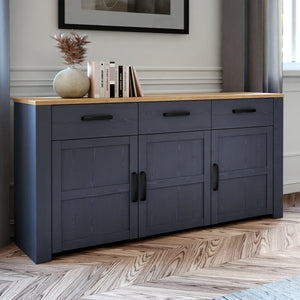 Bohol Sideboard in Riviera Oak/Navy Furniture To Go 801bhlk231-m348 5904767832315 The Bohol collection draws inspiration from its timeless charm and rustic style, embracing its simplicity and natural elegance. What truly sets this collection apart from others is its exquisite decor - featuring three colourways with an Oak finish. The subtle elegance of the light Riviera Oak contributes by adding a focal point to each piece. Also featuring black handles with soft close doors, making it truly stand out in any