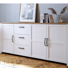 Load image into Gallery viewer, Bohol Large Sideboard in Riviera Oak/White Furniture To Go 801bhlk241r-m482 5904767840532 The Bohol collection draws inspiration from its timeless charm and rustic style, embracing its simplicity and natural elegance. What truly sets this collection apart from others is its exquisite decor - featuring three colourways with an Oak finish. The subtle elegance of the light Riviera Oak contributes by adding a focal point to each piece. Also featuring black handles with soft close doors, making it truly stand ou