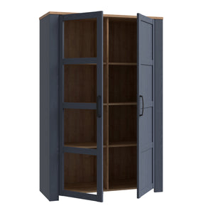 Bohol Display Cabinet in Riviera Oak/Navy Furniture To Go 801bhlv621-m348 5904767832292 The Bohol collection draws inspiration from its timeless charm and rustic style, embracing its simplicity and natural elegance. What truly sets this collection apart from others is its exquisite decor - featuring three colourways with an Oak finish. The subtle elegance of the light Riviera Oak contributes by adding a focal point to each piece. Also featuring black handles with soft close doors, making it truly stand out 
