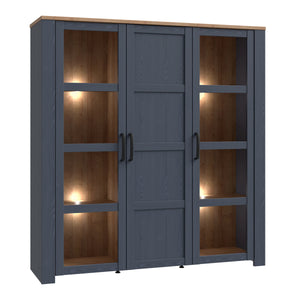 Bohol Large Display Cabinet in Riviera Oak/Navy Furniture To Go 801bhlv631-m348 5904767832285 The Bohol collection draws inspiration from its timeless charm and rustic style, embracing its simplicity and natural elegance. What truly sets this collection apart from others is its exquisite decor - featuring three colourways with an Oak finish. The subtle elegance of the light Riviera Oak contributes by adding a focal point to each piece. Also featuring black handles with soft close doors, making it truly stan