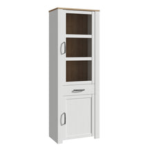 Load image into Gallery viewer, Bohol Narrow Display Cabinet in Riviera Oak/White Furniture To Go 801bhlv712-m482 5904767840570 The Bohol collection draws inspiration from its timeless charm and rustic style, embracing its simplicity and natural elegance. What truly sets this collection apart from others is its exquisite decor - featuring three colourways with an Oak finish. The subtle elegance of the light Riviera Oak contributes by adding a focal point to each piece. Also featuring black handles with soft close doors, making it truly st