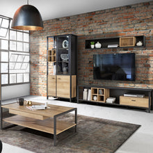 Load image into Gallery viewer, High Rock Wall Shelf in Matt Black/Riviera Oak Furniture To Go 801cerb01-m197 5904767825539 High Rock, a captivating and contemporary collection which has a perfect blend of the Riviera Oak decor with deep black accents, this collection immediately captivates attention with its originality. The sleek black metal handles add a touch of elegance, while the tables boast robust metal legs in a frame-like design, contributing to a distinct loft character within the space. Beyond its striking aesthetics, High Roc