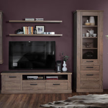 Load image into Gallery viewer, Corona Narrow Display Cabinet in Tabak Oak Furniture To Go 801cr2v812-d64 5904767852719 Discover the captivating allure of the Corona collection, where practicality meets sophistication, the collection offers open recesses, drawers, doors, and shelves. Provide secure and stylish storage solutions with this high-quality selection of furniture. Dimensions: 2120mm x 714mm x 413mm (Height x Width x Depth) 
 Traditional design 
 Dark warm tabak oak effect 
 1 glass door, 1 door 
 1 drawer 
 3 shelves 
 Optional 