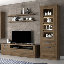 Load image into Gallery viewer, Corona Narrow Display Cabinet in Tabak Oak Furniture To Go 801cr2v812-d64 5904767852719 Discover the captivating allure of the Corona collection, where practicality meets sophistication, the collection offers open recesses, drawers, doors, and shelves. Provide secure and stylish storage solutions with this high-quality selection of furniture. Dimensions: 2120mm x 714mm x 413mm (Height x Width x Depth) 
 Traditional design 
 Dark warm tabak oak effect 
 1 glass door, 1 door 
 1 drawer 
 3 shelves 
 Optional 