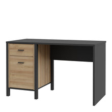 Load image into Gallery viewer, High Rock Desk in Matt Black/Riviera Oak Furniture To Go 801hrkb211l-m197 5904767840693 High Rock, a captivating and contemporary collection which has a perfect blend of the Riviera Oak decor with deep black accents, this collection immediately captivates attention with its originality. The sleek black metal handles add a touch of elegance, while the tables boast robust metal legs in a frame-like design, contributing to a distinct loft character within the space. Beyond its striking aesthetics, High Rock pr
