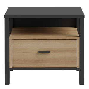 High Rock Bedside in Matt Black/Riviera Oak Furniture To Go 801hrkk011-m197 5904767839635 High Rock, a captivating and contemporary collection which has a perfect blend of the Riviera Oak decor with deep black accents, this collection immediately captivates attention with its originality. The sleek black metal handles add a touch of elegance, while the tables boast robust metal legs in a frame-like design, contributing to a distinct loft character within the space. Beyond its striking aesthetics, High Rock 