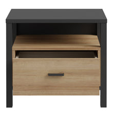 Load image into Gallery viewer, High Rock Bedside in Matt Black/Riviera Oak Furniture To Go 801hrkk011-m197 5904767839635 High Rock, a captivating and contemporary collection which has a perfect blend of the Riviera Oak decor with deep black accents, this collection immediately captivates attention with its originality. The sleek black metal handles add a touch of elegance, while the tables boast robust metal legs in a frame-like design, contributing to a distinct loft character within the space. Beyond its striking aesthetics, High Rock 