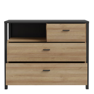 High Rock Chest of Drawers in Matt Black/Riviera Oak Furniture To Go 801hrkk211-m197 5904767839642 High Rock, a captivating and contemporary collection which has a perfect blend of the Riviera Oak decor with deep black accents, this collection immediately captivates attention with its originality. The sleek black metal handles add a touch of elegance, while the tables boast robust metal legs in a frame-like design, contributing to a distinct loft character within the space. Beyond its striking aesthetics, H