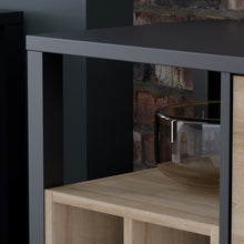 Load image into Gallery viewer, High Rock Storage / Display Chest in Matt Black/Riviera Oak Furniture To Go 801hrkk223-m197 5904767832834 High Rock, a captivating and contemporary collection which has a perfect blend of the Riviera Oak decor with deep black accents, this collection immediately captivates attention with its originality. The sleek black metal handles add a touch of elegance, while the tables boast robust metal legs in a frame-like design, contributing to a distinct loft character within the space. Beyond its striking aesthe