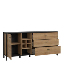 Load image into Gallery viewer, High Rock (Large) Sideboard in Matt Black/Riviera Oak Furniture To Go 801hrkk231-m197 5904767825485 High Rock, a captivating and contemporary collection which has a perfect blend of the Riviera Oak decor with deep black accents, this collection immediately captivates attention with its originality. The sleek black metal handles add a touch of elegance, while the tables boast robust metal legs in a frame-like design, contributing to a distinct loft character within the space. Beyond its striking aesthetics, 