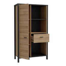 Load image into Gallery viewer, High Rock Wide Shelf Unit in Matt Black/Riviera Oak Furniture To Go 801hrkr521l-m197 5904767840686 High Rock, a captivating and contemporary collection which has a perfect blend of the Riviera Oak decor with deep black accents, this collection immediately captivates attention with its originality. The sleek black metal handles add a touch of elegance, while the tables boast robust metal legs in a frame-like design, contributing to a distinct loft character within the space. Beyond its striking aesthetics, H