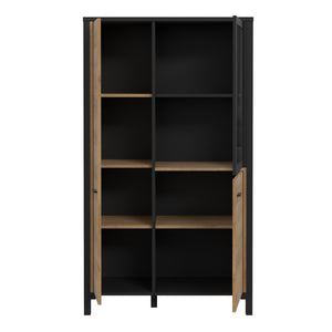 High Rock Small Display Cabinet in Matt Black/Riviera Oak Furniture To Go 801hrkv521-m197 5904767827199 High Rock, a captivating and contemporary collection which has a perfect blend of the Riviera Oak decor with deep black accents, this collection immediately captivates attention with its originality. The sleek black metal handles add a touch of elegance, while the tables boast robust metal legs in a frame-like design, contributing to a distinct loft character within the space. Beyond its striking aestheti