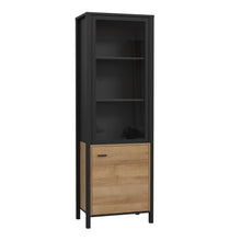 Load image into Gallery viewer, High Rock Wide Display Cabinet in Matt Black/Riviera Oak Furniture To Go 801hrkv711-m197 5904767825515 High Rock, a captivating and contemporary collection which has a perfect blend of the Riviera Oak decor with deep black accents, this collection immediately captivates attention with its originality. The sleek black metal handles add a touch of elegance, while the tables boast robust metal legs in a frame-like design, contributing to a distinct loft character within the space. Beyond its striking aesthetic