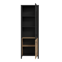 Load image into Gallery viewer, High Rock Wide Display Cabinet in Matt Black/Riviera Oak Furniture To Go 801hrkv711-m197 5904767825515 High Rock, a captivating and contemporary collection which has a perfect blend of the Riviera Oak decor with deep black accents, this collection immediately captivates attention with its originality. The sleek black metal handles add a touch of elegance, while the tables boast robust metal legs in a frame-like design, contributing to a distinct loft character within the space. Beyond its striking aesthetic