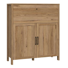 Load image into Gallery viewer, Malte Brun Bar Chest in Waterford Oak Furniture To Go 801mtbk321-d84 5904767829537 Step into a world of refined beauty and exquisite charm with the noble Waterford Oak decor, an exceptional masterpiece that flawlessly imitates the allure of natural wood. Designed to infuse your interior with warmth and sophistication, this extraordinary creation is set to elevate your living space to new heights of opulence. Dimensions: 1331mm x 1165mm x 415mm (Height x Width x Depth) 
 Modern Country Style 
 Rich, warm Wat
