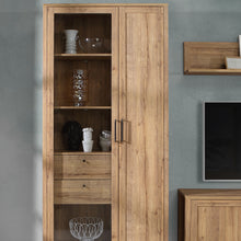 Load image into Gallery viewer, Malte Brun Display Cabinet in Waterford Oak Furniture To Go 801mtbv721r-d84 5904767829568 Step into a world of refined beauty and exquisite charm with the noble Waterford Oak decor, an exceptional masterpiece that flawlessly imitates the allure of natural wood. Designed to infuse your interior with warmth and sophistication, this extraordinary creation is set to elevate your living space to new heights of opulence. Dimensions: 2067mm x 965mm x 415mm (Height x Width x Depth) 
 Modern Country Style 
 Rich, wa