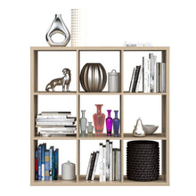 Load image into Gallery viewer, Mauro 3x3 Storage Unit in Sonoma Oak Furniture To Go 801mxxr331-d30f 5904767513085 Mauro units – the epitome of stylish, simple cube storage shelving with endless possibilities. These units will effortlessly transform your living area into a haven of organisation and sophistication. With a range of sizes and colours to choose from, customising your Mauro storage unit to suit your unique style is a breeze. Dimensions: 1073mm x 1072mm x 329mm (Height x Width x Depth) 
 Modern cube style storage unit 
 9 open 