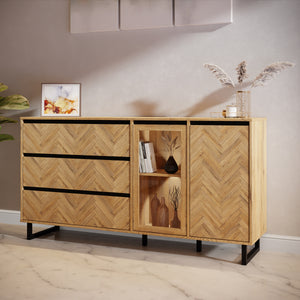 Nikomedes Sideboard in Spica Oak/Matt Black/Bartex Oak Furniture To Go 801nmsk232r-m570 5904767838768 Behold the magnificence of the Nikomedes, a true masterpiece that seamlessly captures the essence of a beautiful contemporary design. This exceptional piece showcases decorative panels that pay homage to the classic wood block floor pattern, infusing your space with a sense of rustic nostalgia and warmth. Embrace the sophistication of this mid-century modern style and complete your living or dining space. D