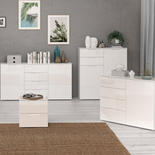 Load image into Gallery viewer, Sienna Bedside in White/White High Gloss Furniture To Go 801snnk011-v29 5904767867515 The Sienna collection, a mesmerising fusion of white high gloss living and bedroom furniture that embodies the essence of modern sophistication. With its contemporary allure, the Sienna collection effortlessly complements any room decor, making it a versatile and stylish choice for your home. Dimensions: 497mm x 504mm x 344mm (Height x Width x Depth) 
 Modern, sleek design 
 White gloss finish 
 2 drawers 
 Cut-out handles