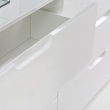 Load image into Gallery viewer, Sienna 4 Chest of Drawers 1 Door in White/White High Gloss Furniture To Go 801snnk221-v29 5904767147808 The Sienna collection, a mesmerising fusion of white high gloss living and bedroom furniture that embodies the essence of modern sophistication. With its contemporary allure, the Sienna collection effortlessly complements any room decor, making it a versatile and stylish choice for your home. Dimensions: 849mm x 1101mm x 344mm (Height x Width x Depth) 
 Modern, sleek design 
 White gloss finish 
 1 door 
