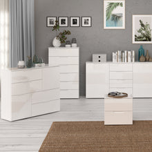 Load image into Gallery viewer, Sienna Chest of 6 Drawers in White/White High Gloss Furniture To Go 801snnk411-v29 5904767147839 The Sienna collection, a mesmerising fusion of white high gloss living and bedroom furniture that embodies the essence of modern sophistication. With its contemporary allure, the Sienna collection effortlessly complements any room decor, making it a versatile and stylish choice for your home. Dimensions: 1201mm x 702mm x 344mm (Height x Width x Depth) 
 Modern, sleek design 
 White gloss finish 
 6 drawers 
 Cut