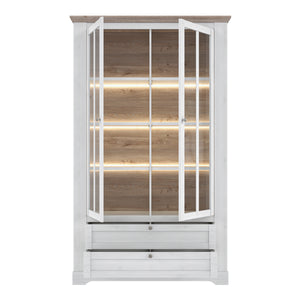 Illopa Iloppa Display Cabinet in Snowy Oak/Oak Nelson Furniture To Go 801tiqv722b-j99 5904767878481 Enhance the ambiance of your home with the exquisite Illopa collection, a seamless fit for any living space. Its most outstanding feature lies in the array of shapes it offers, granting you the freedom to artistically arrange every room in your house, from the inviting hall to the cozy living room. The captivating combination of beautiful white and oak imbues your home with a sense of tranquility, fostering a