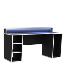 Load image into Gallery viewer, Tezaur Gaming Desk with LED in Black/White in White/Black Furniture To Go 801tzrb211b3-m240 5904767837761 Bold, stylish, and designed to cater to every gaming enthusiast&#39;s dream, the Tezaur is more than just a desk; it&#39;s an experience. Crafted with precision and attention to detail, this masterpiece is the perfect companion for your customers gaming consoles, elevating their setup to new heights. And let&#39;s talk about lighting - the Tezaur takes it to the next level. Embedded with built-in strip lights, this