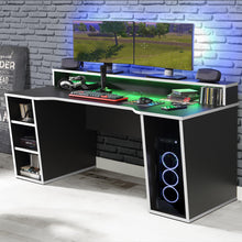 Load image into Gallery viewer, Tezaur Gaming Desk with LED in Black/White in White/Black Furniture To Go 801tzrb211b3-m240 5904767837761 Bold, stylish, and designed to cater to every gaming enthusiast&#39;s dream, the Tezaur is more than just a desk; it&#39;s an experience. Crafted with precision and attention to detail, this masterpiece is the perfect companion for your customers gaming consoles, elevating their setup to new heights. And let&#39;s talk about lighting - the Tezaur takes it to the next level. Embedded with built-in strip lights, this
