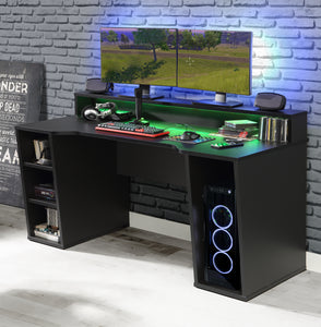 Tezaur Gaming Desk 2 Shelves with LED in Matt Black Furniture To Go 801tzrb211b3-z113 5904767892814 Bold, stylish, and designed to cater to every gaming enthusiast's dream, the Tezaur is more than just a desk; it's an experience. Crafted with precision and attention to detail, this masterpiece is the perfect companion for your customers gaming consoles, elevating their setup to new heights. And let's talk about lighting - the Tezaur takes it to the next level. Embedded with built-in strip lights, this desk 