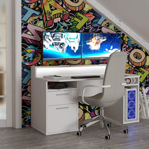 Tezaur Gaming Desk with Blue LED in White Furniture To Go 801tzrb213b3-z12m 5904767899806 Bold, stylish, and designed to cater to every gaming enthusiast's dream, the Tezaur is more than just a desk; it's an experience. Crafted with precision and attention to detail, this masterpiece is the perfect companion for your customers gaming consoles, elevating their setup to new heights. And let's talk about lighting - the Tezaur takes it to the next level. Embedded with built-in strip lights, this desk will trans