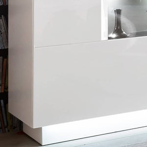 Sensis 84 Display Sideboard Cabinet Arte-N A4DE0084II Sensis is a stunning display sideboard finished in the captivating white gloss. It has three partially-glassed hinged doors, each offering three compartments behind for storage. Part of its interior can be lit up with LED lighting that is available separately for purchase. Full W160cm x H85cm x D43cm Colours Front: White High Gloss Carcass: White Three Partially glassed Doors <a href="https://www.arte-n.co.uk/collections/living-room-sensis/products/sensi