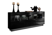 Load image into Gallery viewer, Nata 84 Display Sideboard Cabinet Arte-N A4NASS084 Sleek ultra-modern, this sideboard cabinet with three partially-glassed hinged doors is a gorgeous addition to any room. Its interior can be upgraded with optional LED lights to put a spotlight on exhibited items. Full W160cm x H85cm x D43cm Colours Front: Black High Gloss Carcass: Black Matt Three Partially glassed Doors LED Lighting - Optional Made from 16mm high-quality laminated board Matching Wall Unit Available Assembly Required Weight: 68kg Estimated