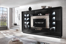 Load image into Gallery viewer, Nata VA Entertainment Media Wall Unit Arte-N A4NASSVA Exemplify luxury by choosing a modern style entertainment unit that allows you to gloriously showcase your prized possessions. With the Nata VA, you get a myriad of storage options to utilize this, including eight exclusive, glassed display sections, six open compartments fourteen closed compartments. Full W275cm x H190cm x D40cm Colours: Front: Black Gloss Carcass: Black Matt TV Cabinet W165cm x H50cm x D40cm Weight Capacity on Top - 40kg Can hold up to