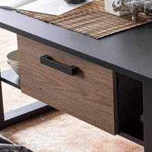 Load image into Gallery viewer, Nordi Coffee Table Arte-N A4NRSK900 Its modern, rectangular design makes this coffee table versatile highly practical. Two open compartments on either side of the drawer provide storage space for magazines, newspapers other daily essentials, while the drawer itself is large enough to store remote controllers, casual snacks similar small items without cramping your visual space. Finished in an elegant combination of matt black warm oak tones, this stylish coffee table will enhance any decor. W110cm x H48cm x