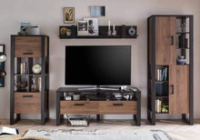 Load image into Gallery viewer, Nordi VB Living Room Set Arte-N A4NRSKVB This stunning living room furniture set includes a TV cabinet, two tall cabinets a broad wall shelf. It offers a plethora of storage options, a stunning centre piece to a living room, with the eye-catching Okapi Walnut finish. Beautifully crafted with the highest quality stards to have a premium look, feel durability. W315cm x H200cm x D43cm Colour: Okapi Walnut Black Matt Four Hinged Doors Drawers Multiple Shelves Closed Compartments Matching Furniture Available Mad