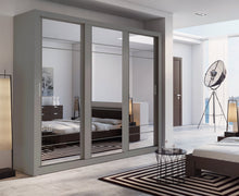 Load image into Gallery viewer, Arti AR-02 Sliding Door Wardrobe 250cm Arte-N ARTI AR-02-B The AR-02 is a brilliantly designed wardrobe with three mirrored doors aesthetic craftsmanship. It sts apart with its large, functional structure offers storage space in the form of seven compartments two exclusive hanging spaces. : W250cm x H215cm x D60cm Three Sliding Doors  Mirrors Two Hanging Rails [Additional Available To Purchase If Shelves Replaced] Six Shelves Made from 16mm high-quality laminated board  Weight: 223kg  Estimated Direct Home 